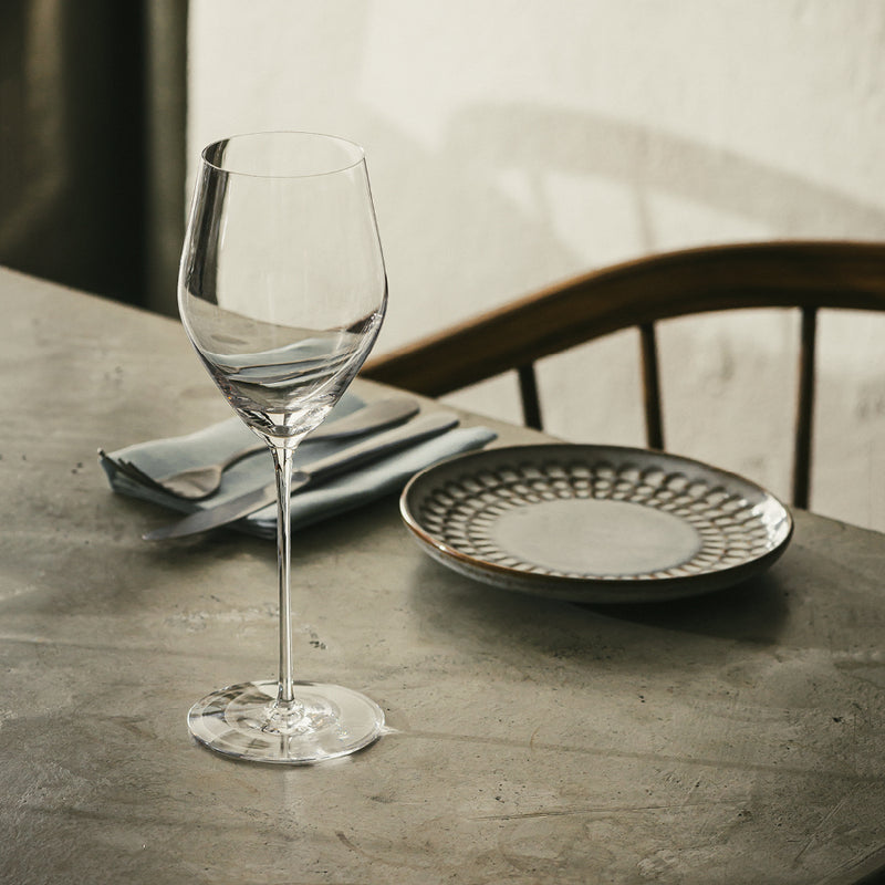 Icon champagneglass på dekket bord