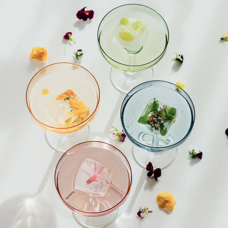 Odysse cavaskål sett overnfra i fargene rosa, blå, grønn og oransje